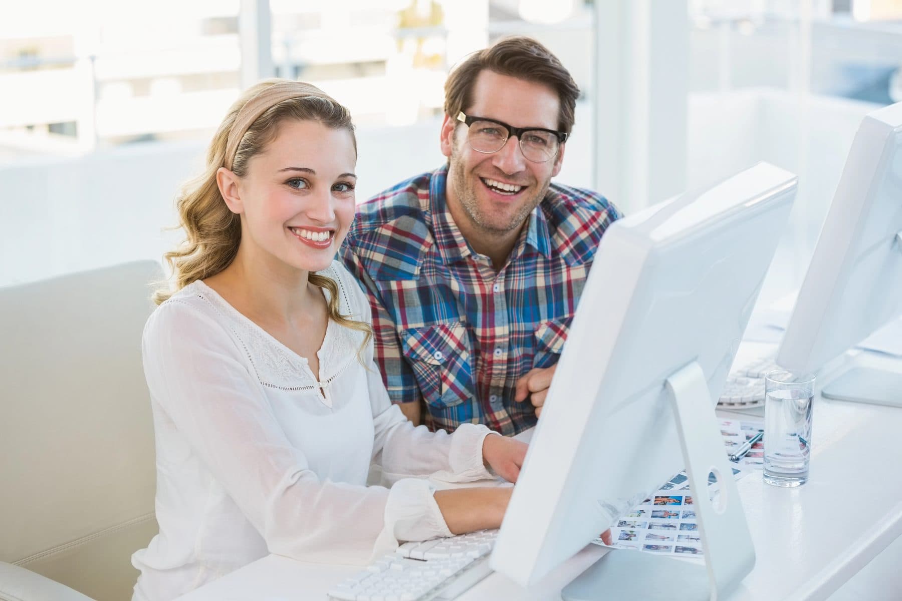 A Network Gurus technician helping a client at their office